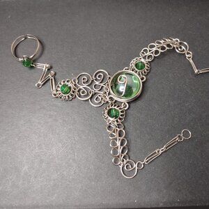 7.75 Inch Green And Silver Tone Slave Bracelet